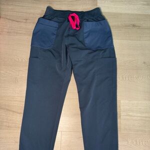 Figs women’s technical scrubs Navy Pockets and Pink Drawstring